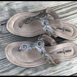 Minnetonka slides . Silver metallic. Size 8.5